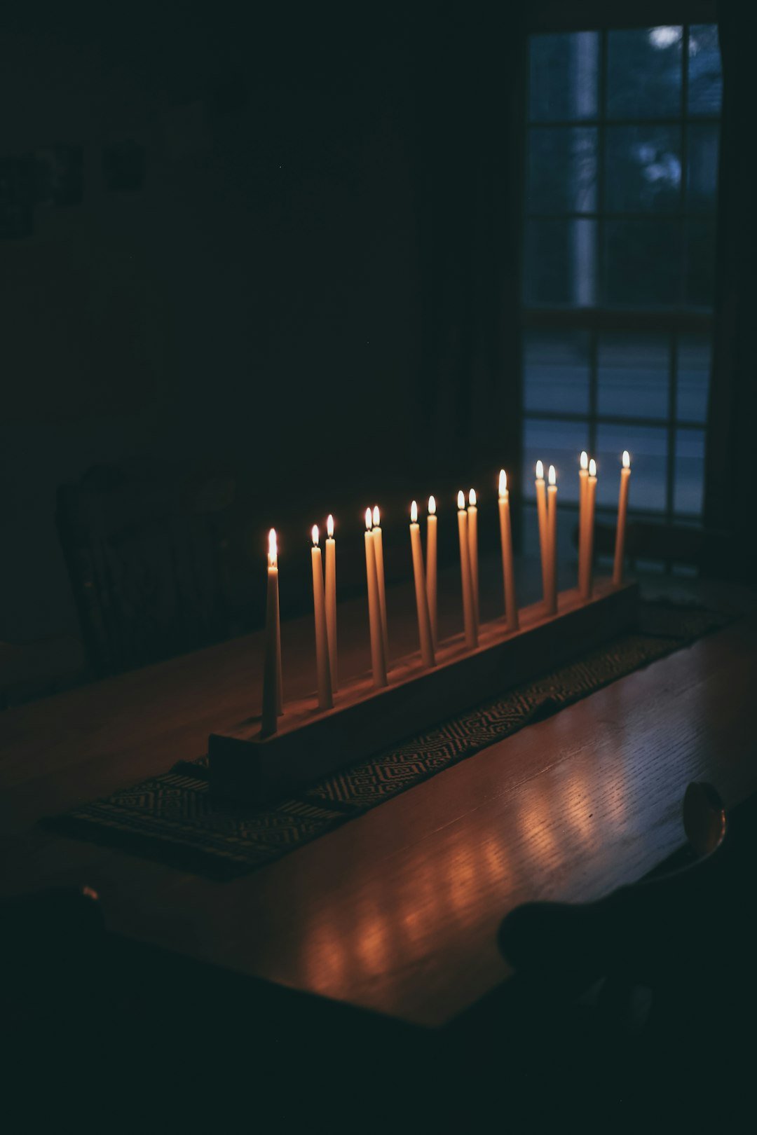 candles on brown wooden table