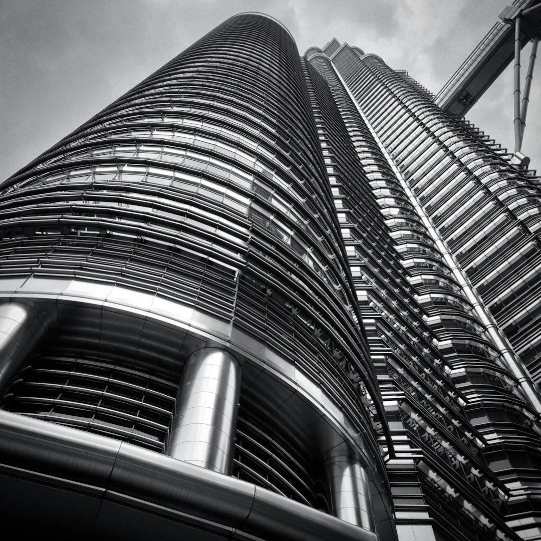 a very tall building with a sky background