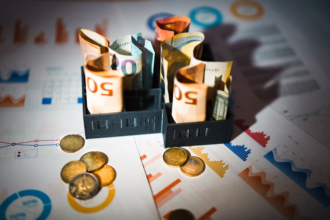 A pile of money sitting on top of a table