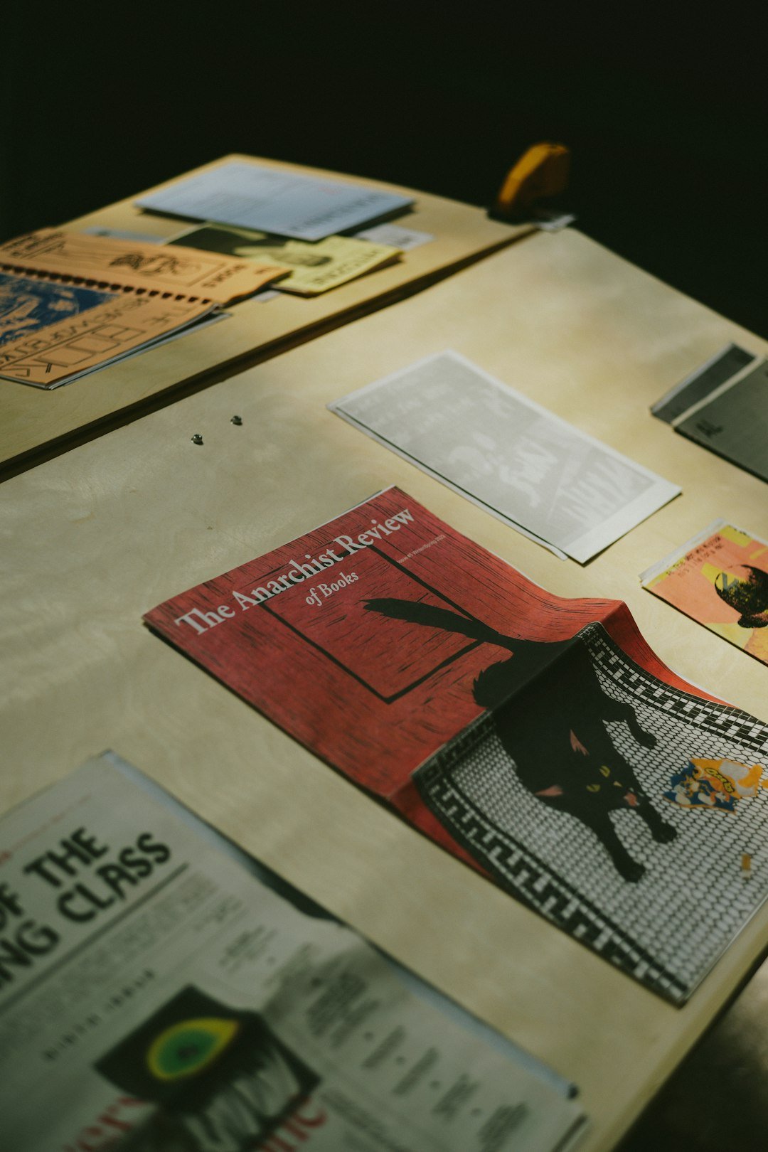 a table topped with lots of different types of papers