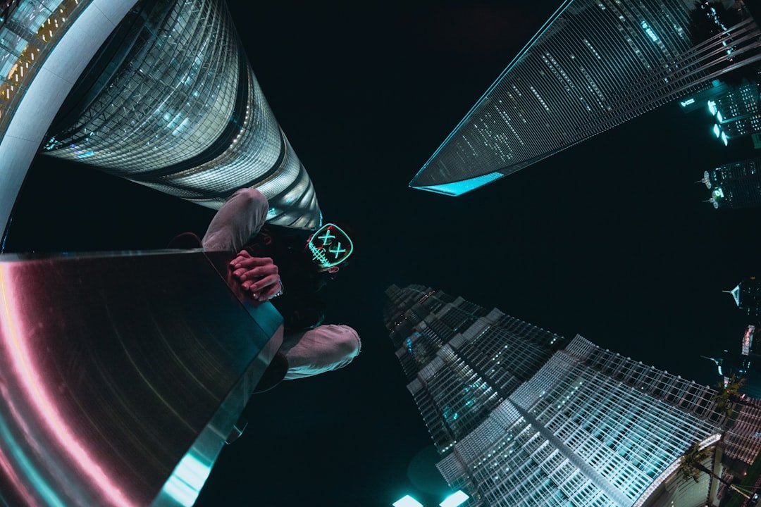 worm's eye 360 view photograph of four high-rise buildings