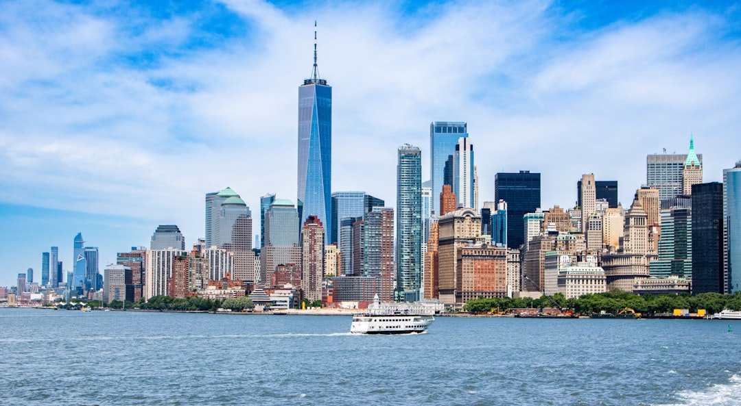 A large body of water with a city in the background