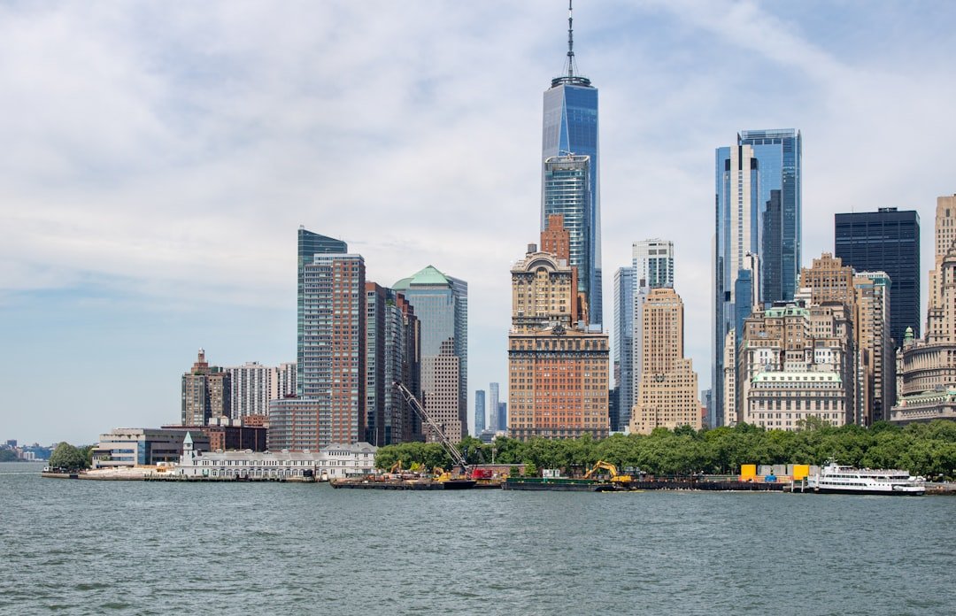 A large body of water with a city in the background