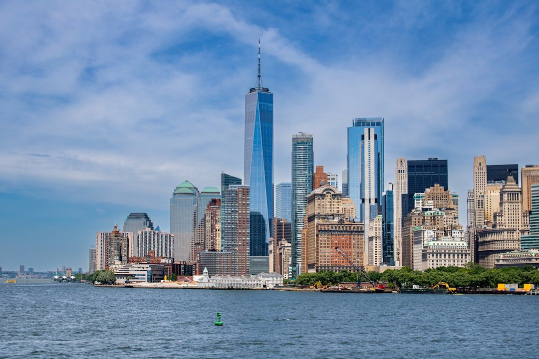 A large body of water with a city in the background