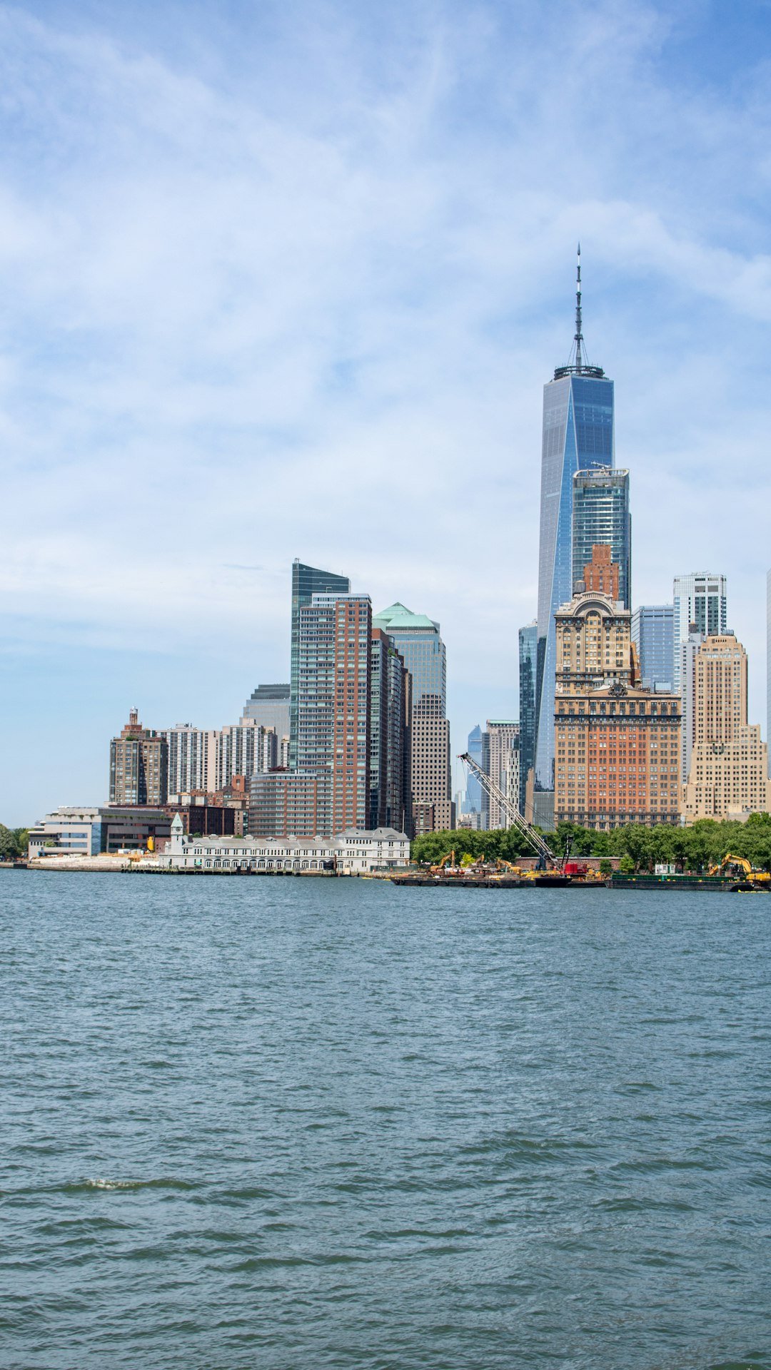 A large body of water with a city in the background