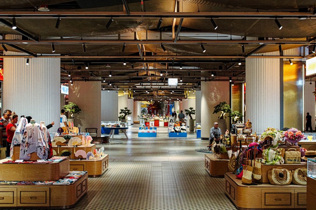 Interior view of a well-lit retail store with merchandise displays.