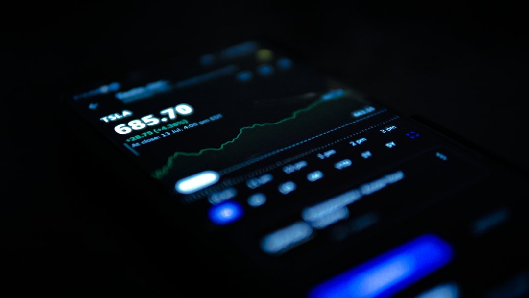 black android smartphone displaying 11 00