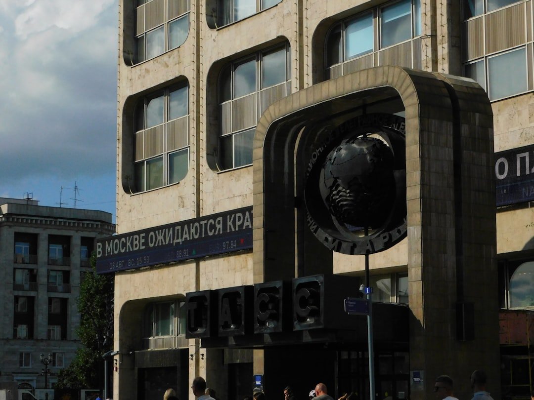 Modern building with abstract sculpture in front