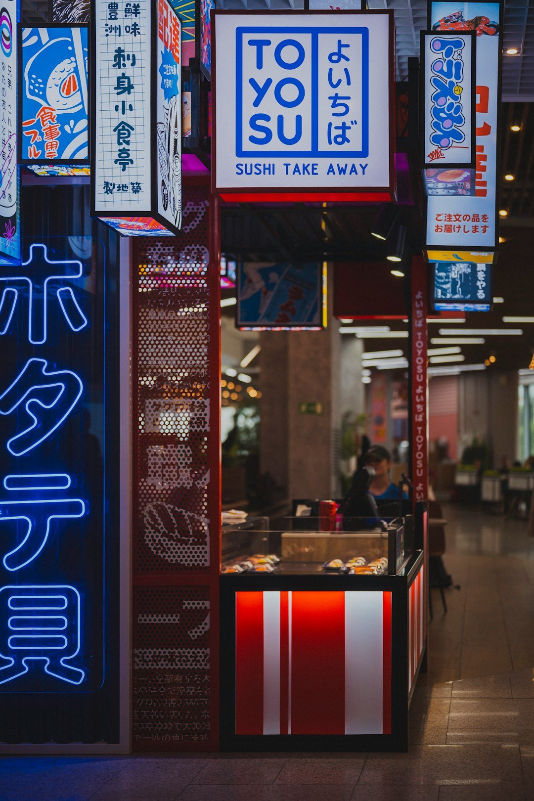 Sushi take away stall with japanese signs